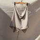 Top con cuello volcado y espalda descubierta